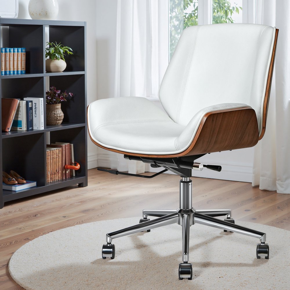 White office chair with wooden accents in a room with a bookshelf and window.